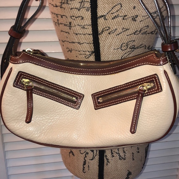 Dooney & Bourke Handbags - Dooney & Bourke Cream zippered Leather Purse